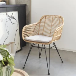 Rattan armchair with removable cushion