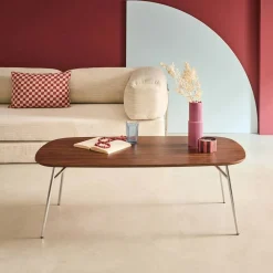 Rectangular coffee table with chrome legs and wood decor