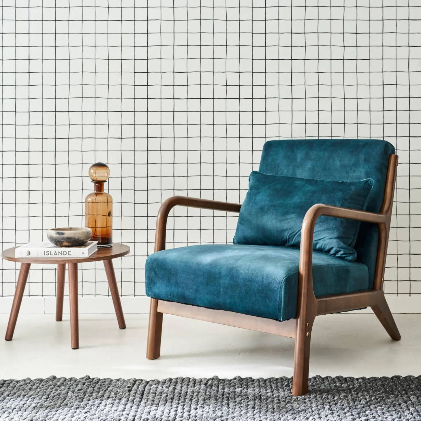 Scandi-style armchair in velvet and light walnut-stained hevea wood