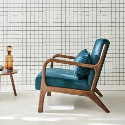 Scandi-style armchair in velvet and light walnut-stained hevea wood
