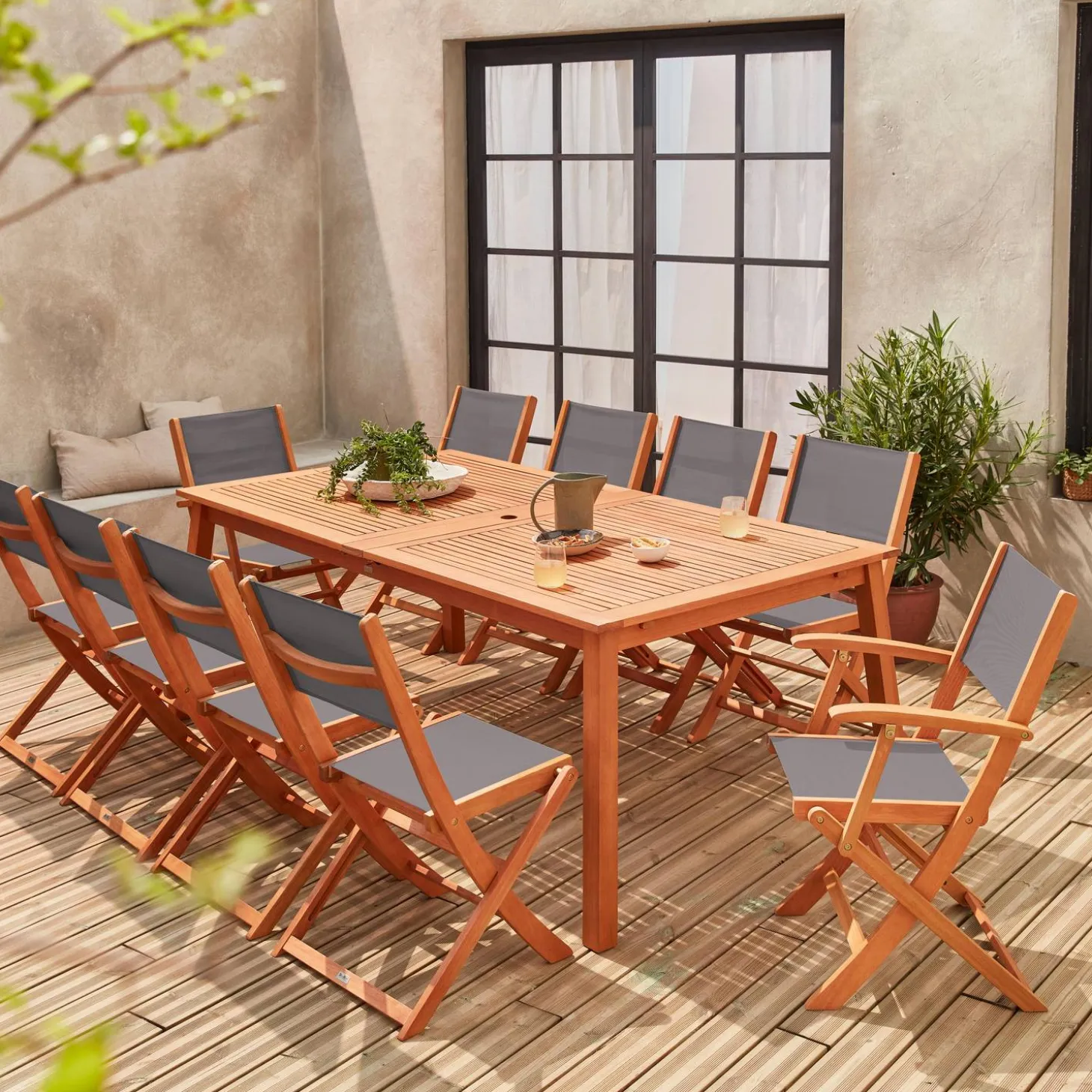 10-seater extendable wooden garden table set with chairs