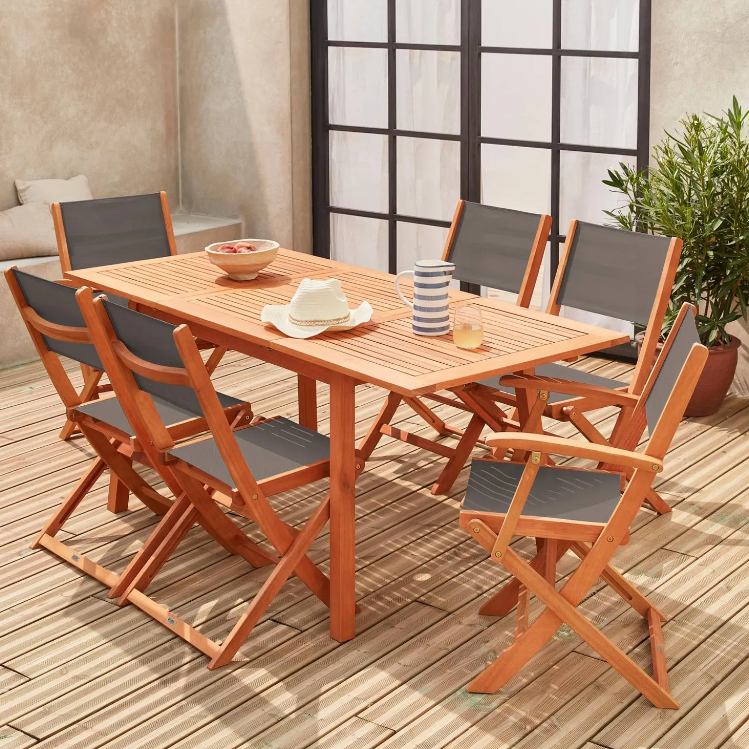 6-seater extendable wooden garden table set with chairs