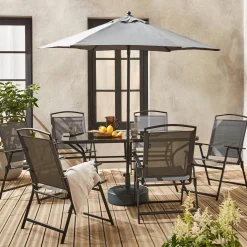6-seater metal dining set with foldable chairs and parasol