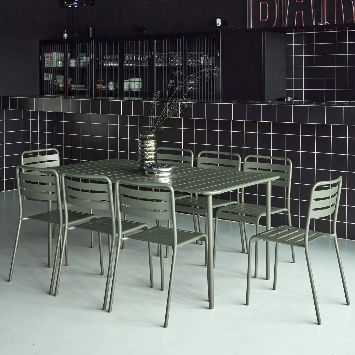 8-seater metal garden table with 8 chairs