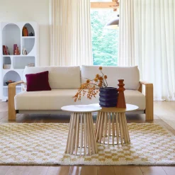 3-seater sofa bed in white boucle with wooden armrests