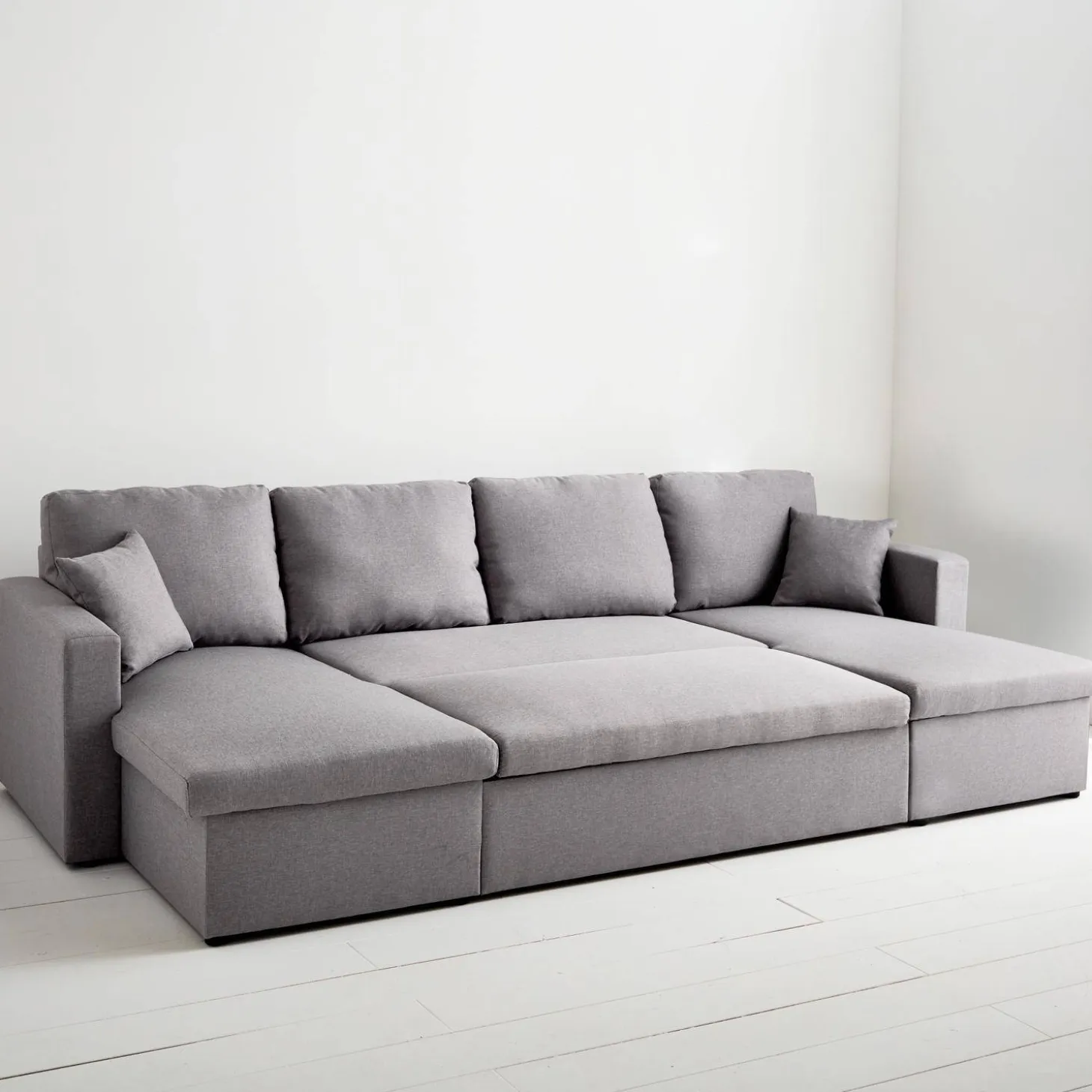 4-seater u shaped sofa bed in fabric