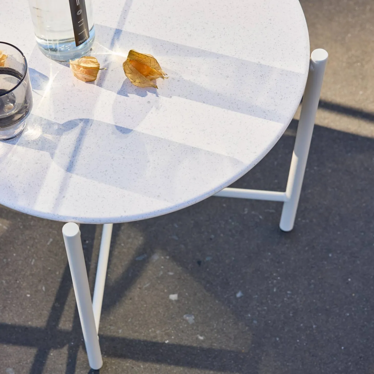 Set of 2 garden lounge chairs with round steel table