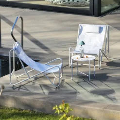 Set of 2 garden lounge chairs with round steel table