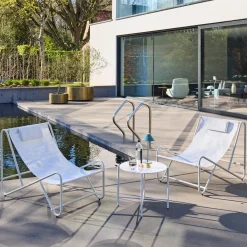 Set of 2 garden lounge chairs with round steel table