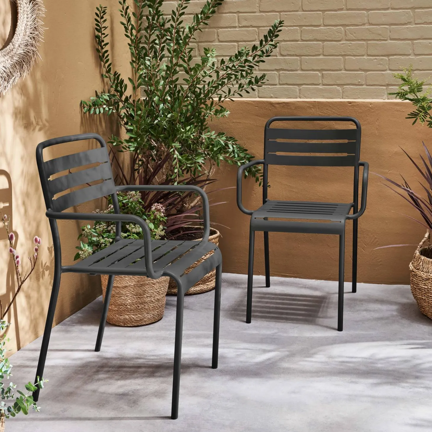 Set of 2 stackable steel garden armchairs