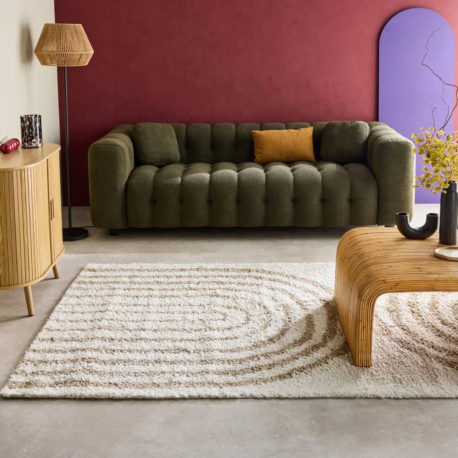 Shaggy indoor rug, rainbow geometric patterns, beige.