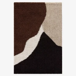 Shaggy indoor rug with geometric patterns in beige, brown and black