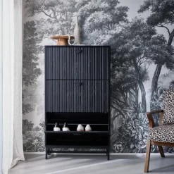 Shoe cabinet with grooved doors