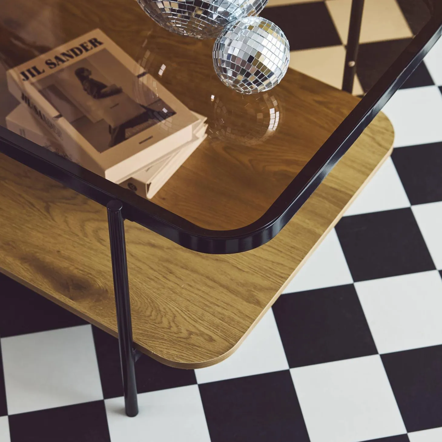 Vintage coffee table with black metal and wood effect