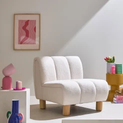 Wooden armchair with rounded legs in boucle fabric