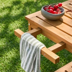 Wooden barbecue sideboard with wheels and a handle